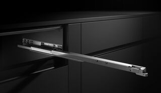 GRASS Dynapro concealed slide mounted under a drawer